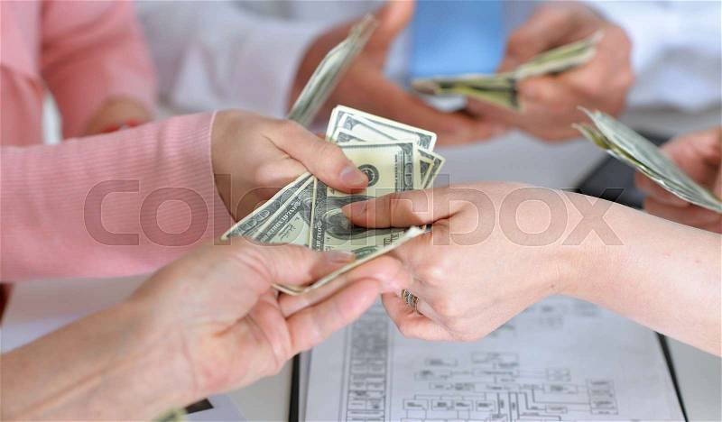 Hands keep money on the desktop background, stock photo