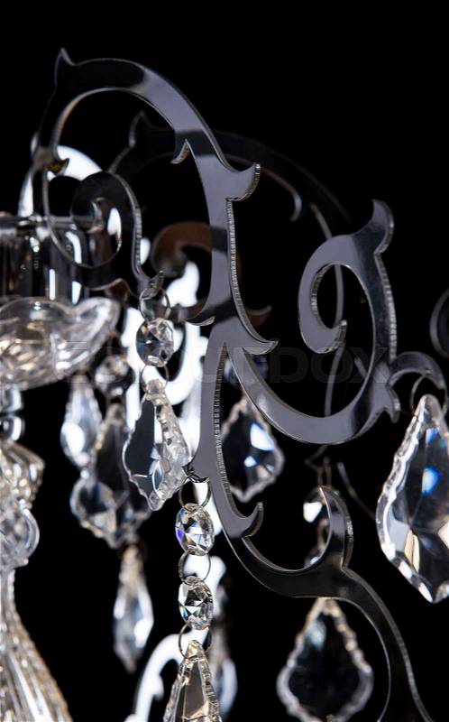 Metal silver chandelier details, modern style isolated on black background. Luxury expensive chandelier for living room, Hall of celebration interior, stock photo