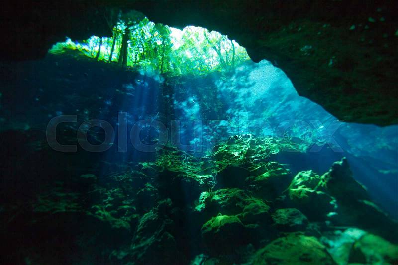 Entrance area of beautiful Azul cenote underwater cave, view from below, stock photo