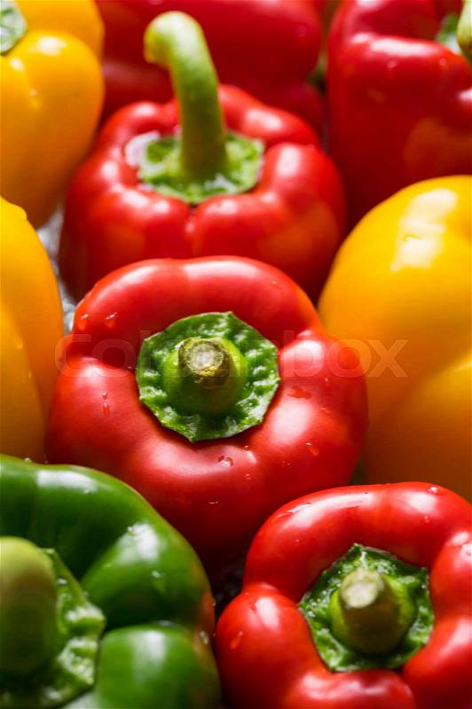 Fresh sweet yellow, green and red peppers. Vegetables macro, stock photo