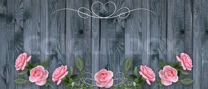 Banner with pink roses and ornament on background of shabby wooden planks. Copy space, stock photo