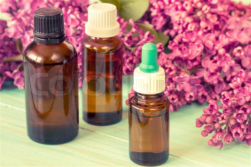 Small bottles with aroma oil , stock photo