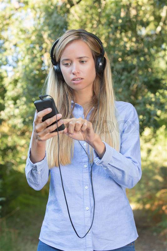 Youth woman with a headset, stock photo