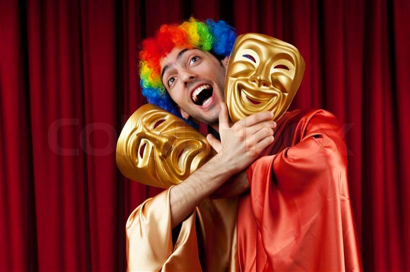 Actor with maks in a funny theater concept, stock photo