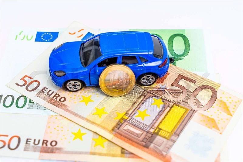 Model car and money - buy a car, stock photo