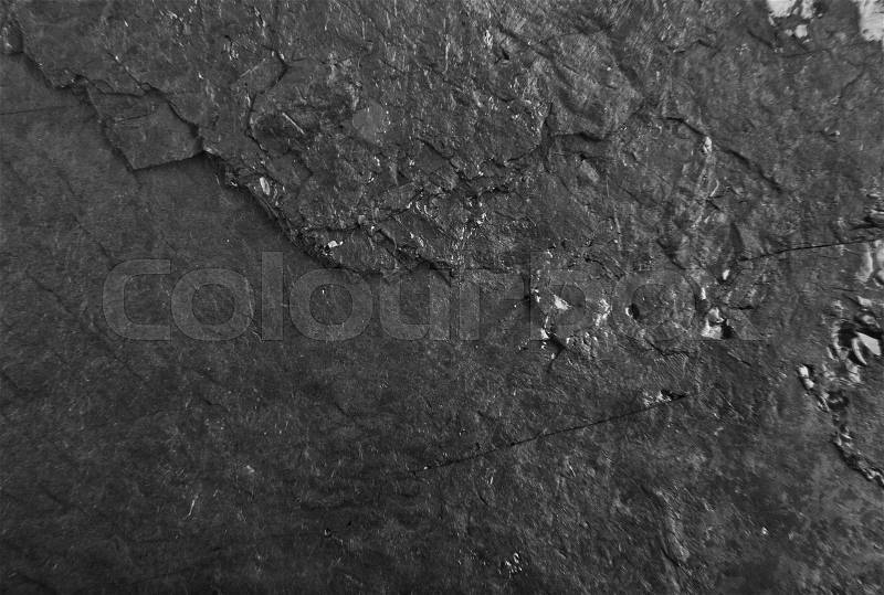 Black background, cutting the layer of coal as background, stock photo