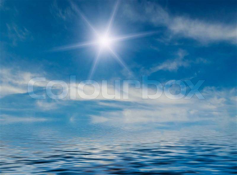Amazing sun and blue sky above the ocean, stock photo