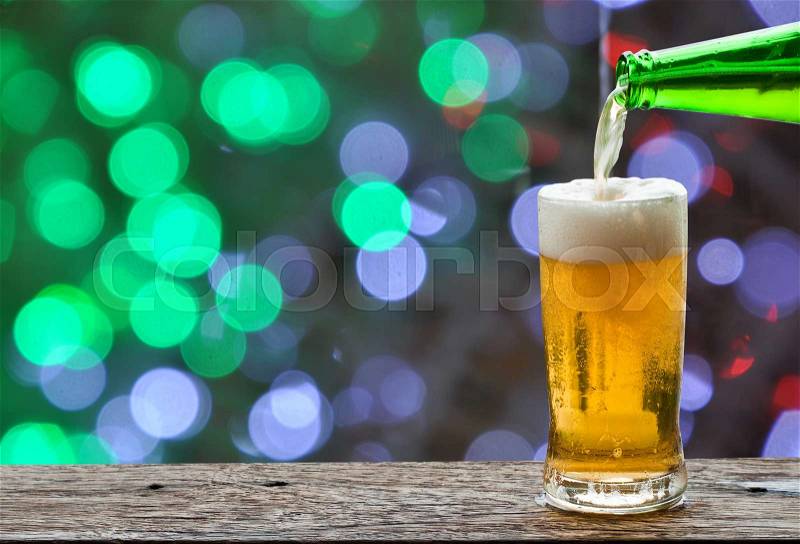 Enjoy beer in night club, stock photo