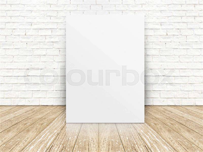 Paper poster on the white brick wall and the wood floor,template for your content, stock photo