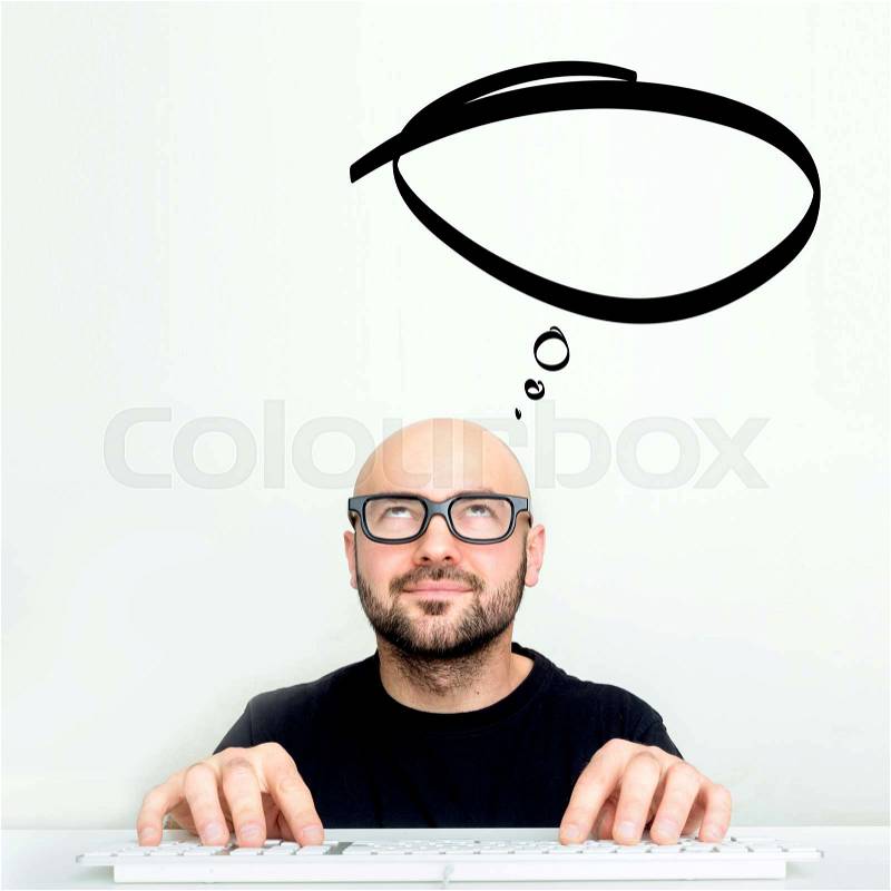 Portrait view of an attractive dubious geek man with thinking comics bubble over his head , stock photo