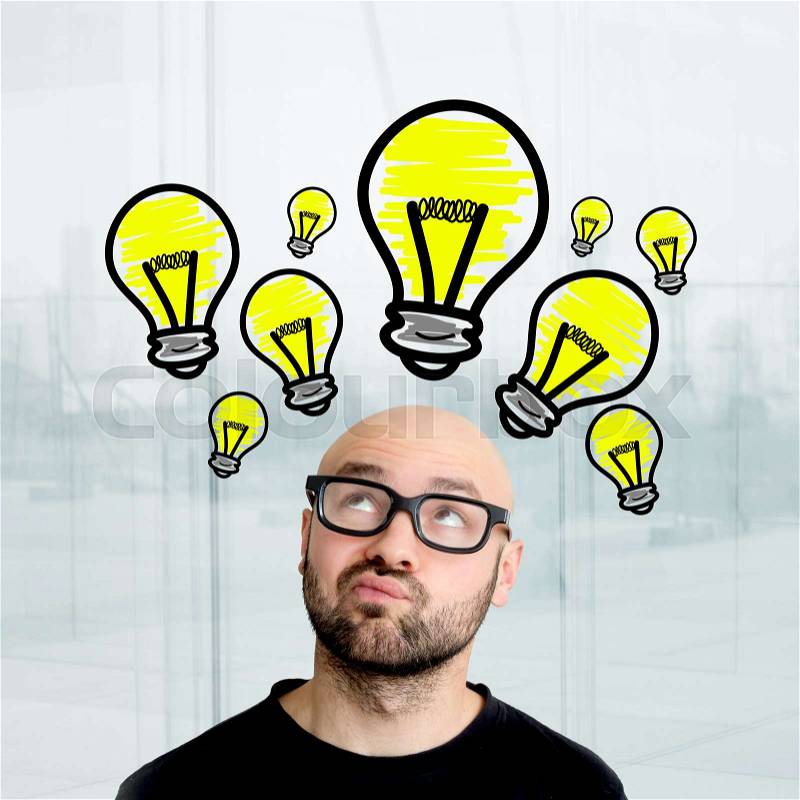Portrait of a businessman searching good idea with bulb lamp over his head - Imagination concept, stock photo