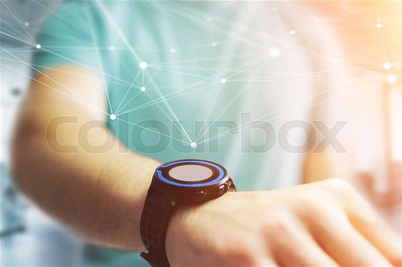 View of a Hand holding smartwatch with operating system screen and network connection , stock photo
