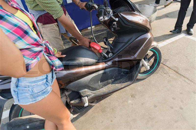 Couple On Gas Station Man Fuel Motor Bike, Man And Woman Closeup Buy Patrol, stock photo