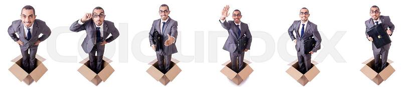 Man in thinking outside the box concept, stock photo