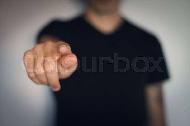 Man pointing finger at you, stock photo