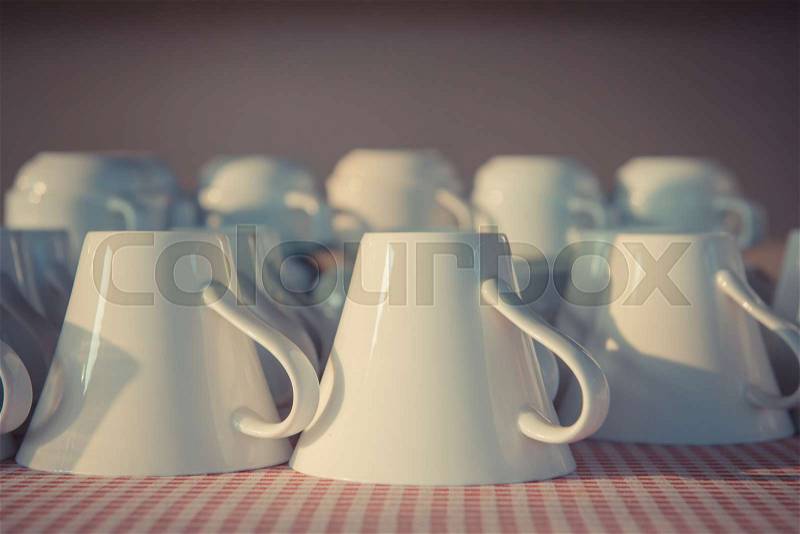 Many white coffee cups in a line buffet for breakfast, stock photo