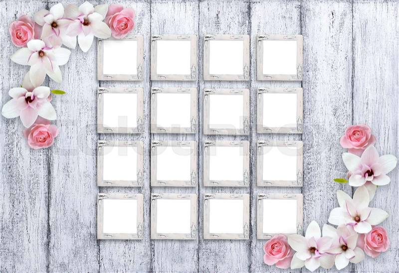Set of sixteen empty retro photo frames with magnolia flowers and roses on background of shabby wooden planks in rustic style, stock photo