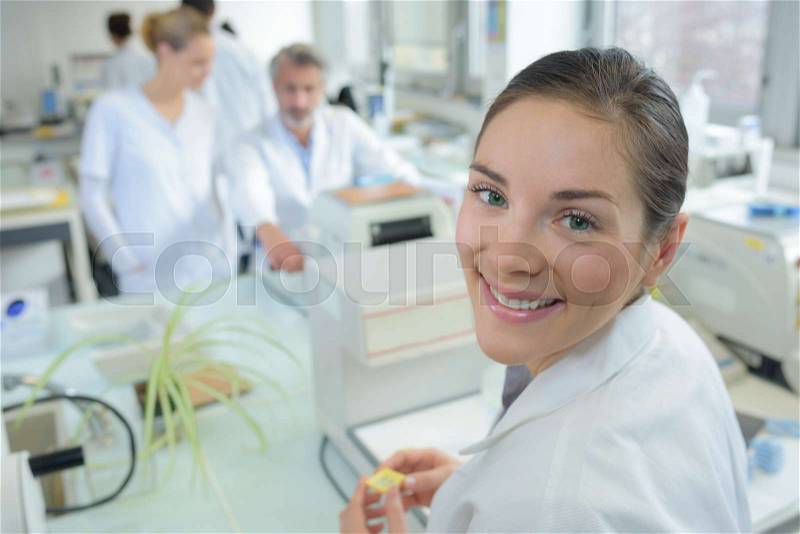 Portrait of a female researcher doing research in a lab, stock photo