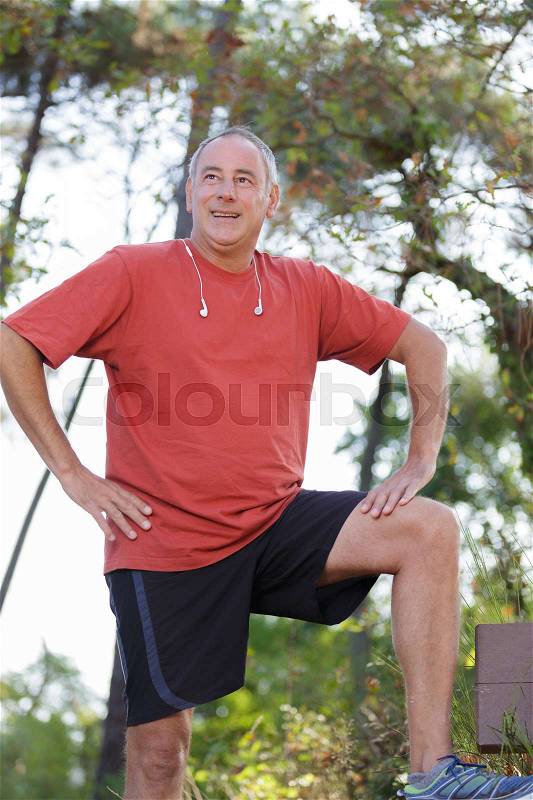 Fit male runner posing before running, stock photo - Stock Image ...