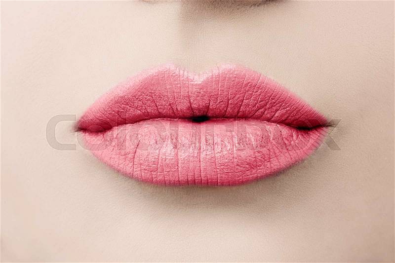 Female Beauty. Love Lips Macro. Kissing Lips with Pink Color Makeup, stock photo