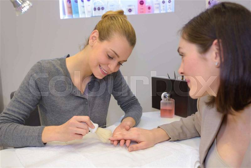 Appointment with a nail technician, stock photo
