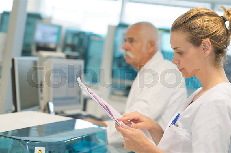 Chemists in the lab, stock photo