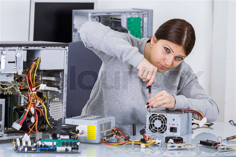 Happy computer female technician, stock photo