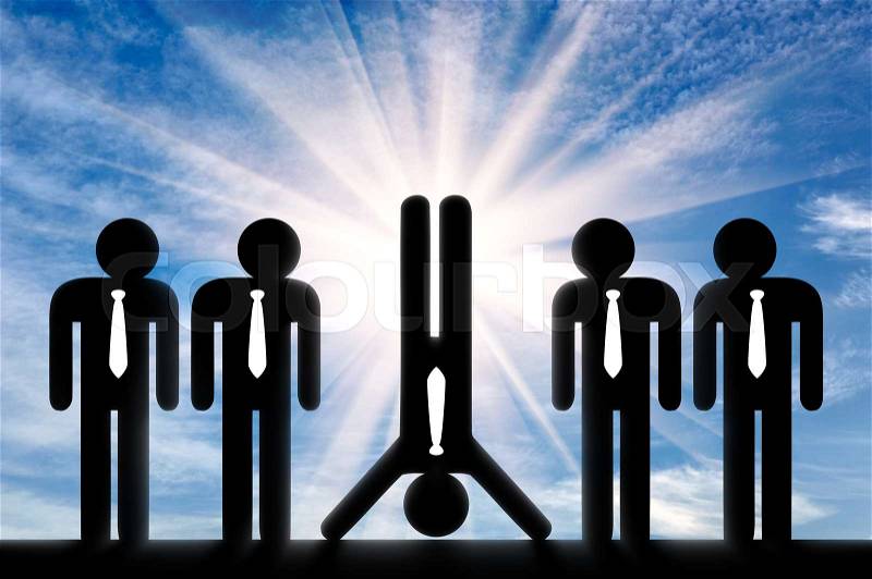Stand out from the crowd concept. Man standing on hands stands out among ordinary people standing up, stock photo