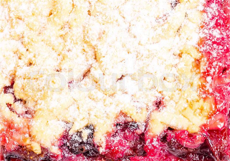 Delicious cherry pie with powdered sugar. Macro. Photo can be used as a whole background, stock photo