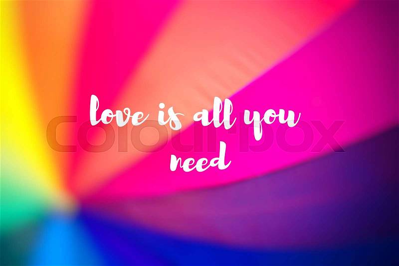 Love is all you need. Rainbow coloured umbrella, stock photo