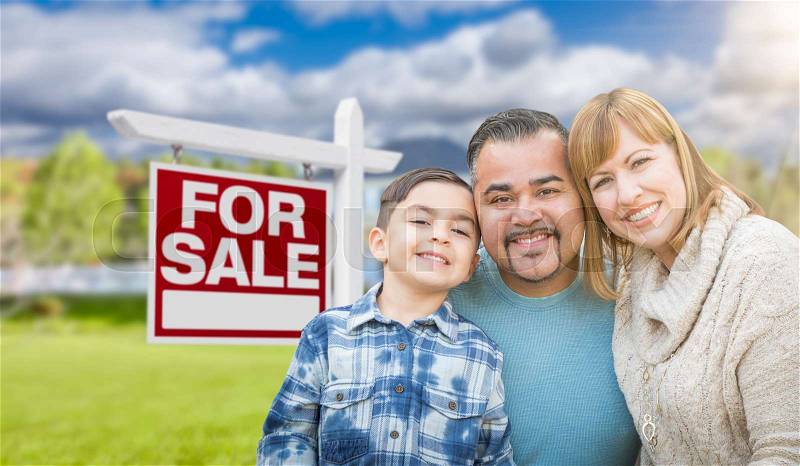 Mixed Race Family Portrait In Front of House and For Sale Real Estate Sign, stock photo
