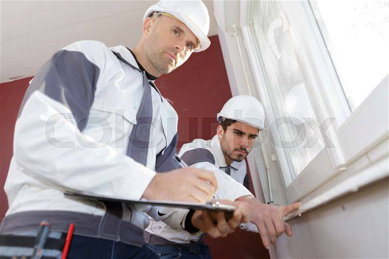 Windows installation workers, stock photo