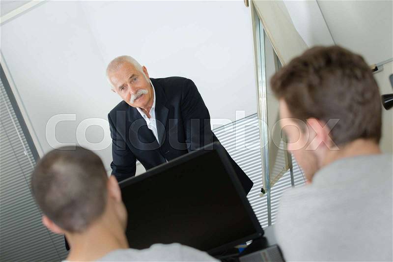 Teacher and students on lecture, stock photo