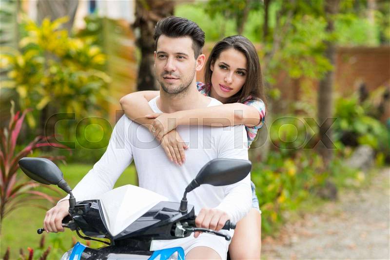 Couple Riding Motorcycle, Young Man Woman Happy Smiling Tourist Travel Bike Tropical Forest Exotic Vacation Summer Holiday, stock photo