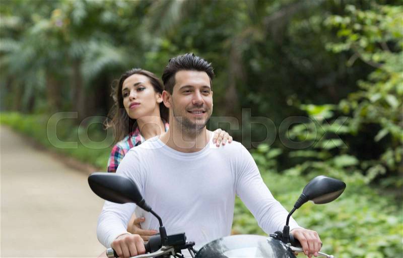 Couple Riding Motorcycle, Young Man Woman Happy Smiling Tourist Travel Bike Tropical Forest Exotic Vacation Summer Holiday, stock photo