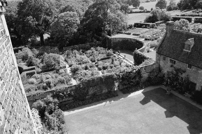 Wonderful view over the gardens and the estate Sissinghurst Castle in England in the summer in black and white, stock photo