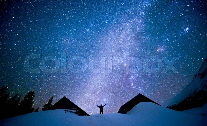 Human on the background of the starry sky, stock photo