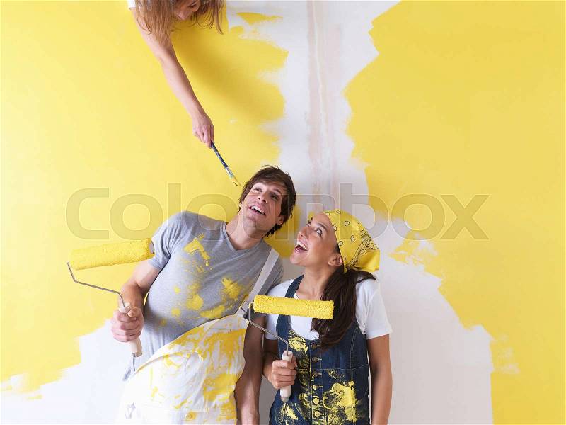 Couple messing around with paint, stock photo