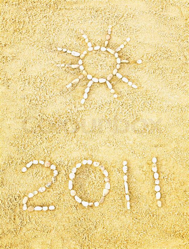 Date and sun in sand, stock photo