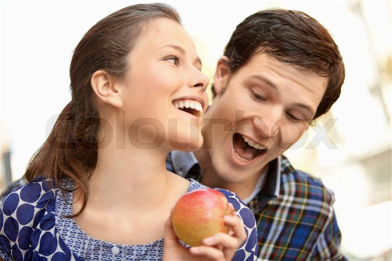 Young people buying fruits and vegetable, stock photo