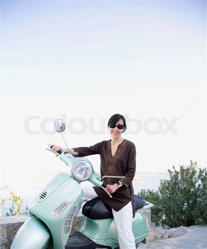 Woman on motorcycle, stock photo