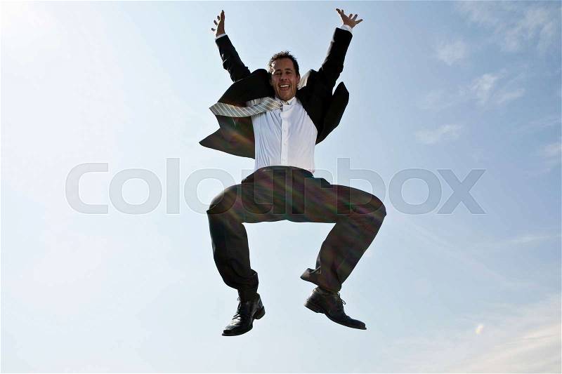 Business man jumping, stock photo