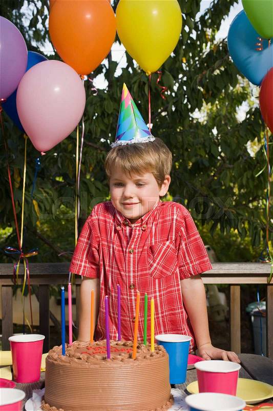 Boy at birthday party, stock photo