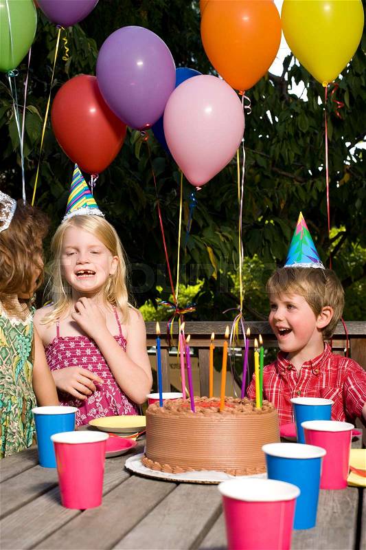 Children at birthday party, stock photo