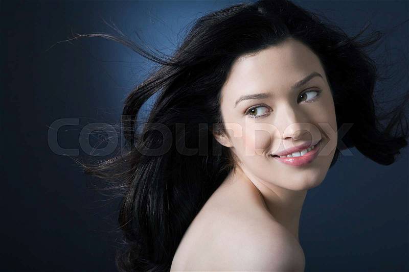 Woman with movement in hair, stock photo