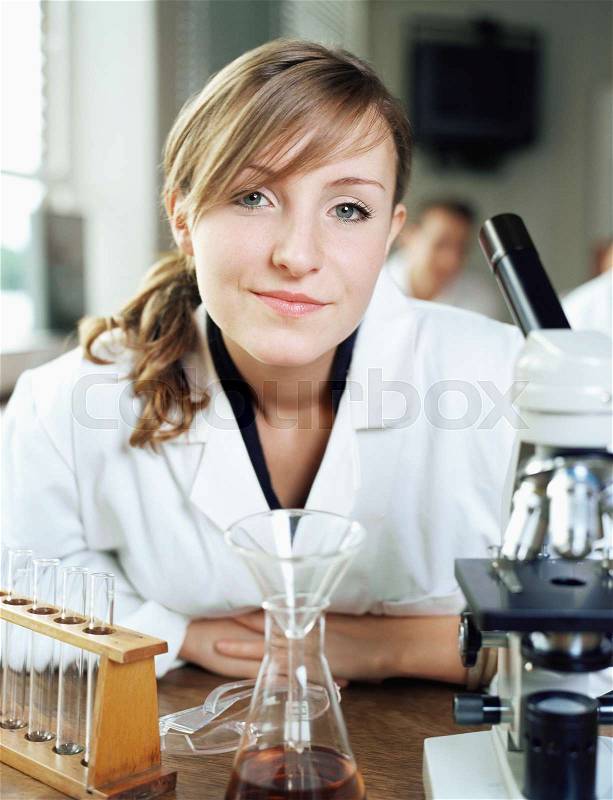 Girl in a chemistry class, stock photo