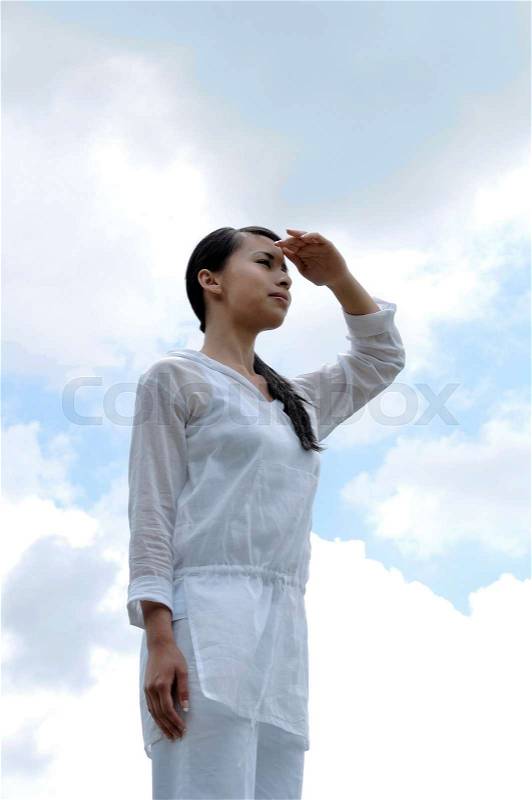 Woman looking at the horizon, stock photo