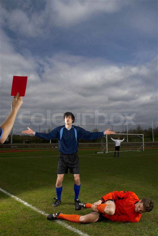 Player being shown the red card, stock photo