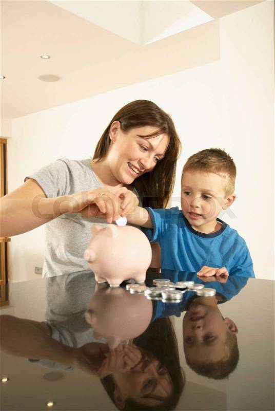 Mum and son with money, stock photo