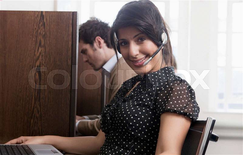 Portrait of call a call center operator, stock photo